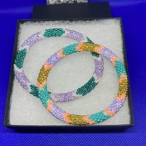 Sashka Purple Power stretch bracelet set of 2 with box.